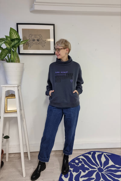 Unisex sweater More Myself Than Yesterdays Self: Dark grey +Black and Purple print Organic cotton