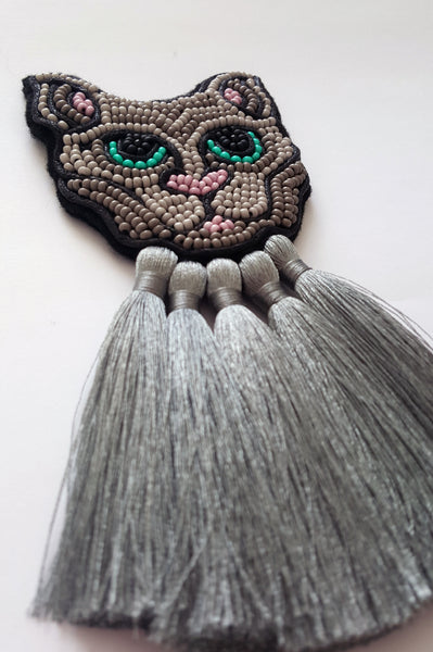 Grey Cat with grey tassels