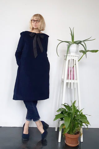 Dark Blue Corduroy Dress with a Black Bow tie.