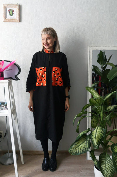 Elegant, Super Cool, Comfortable, Easy to Wear and Versetile Mama Africa Oversized Shirt Dress in Black Linen and Cool Details made from Bright Orange-Red Cotton Fabric directy from Africa