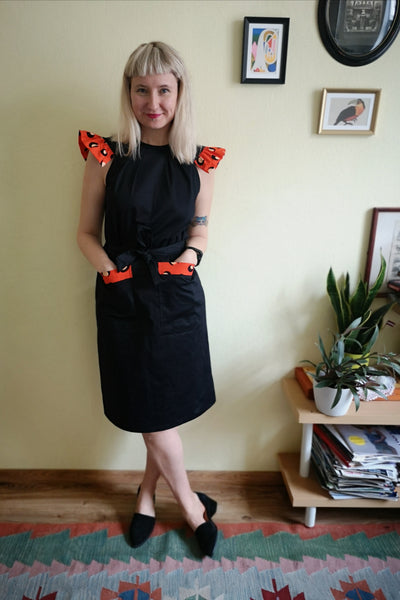 Powerful and Fun Black Cotton Space Princess Aviators Straight Pencil dress with Contrasting Orange-Red Wings