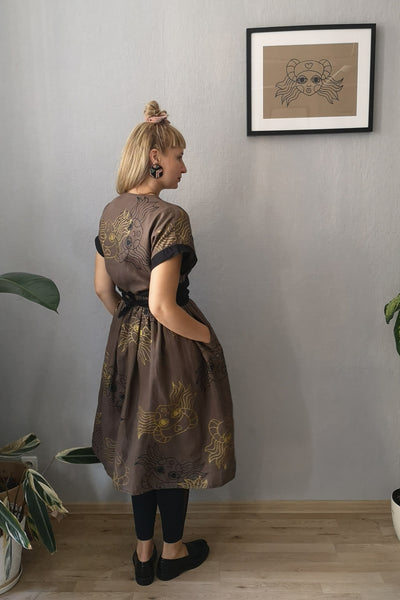 Kimono Transformer Wrap Dress "Diane fon Furstenberg"  with Wide Skirt Detail Made from Hand Printed Lāčplēsene Patterned Sand and Gold Colored Linen