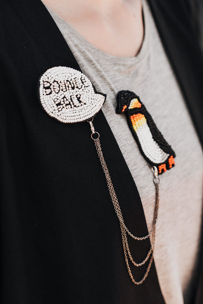 Chain pin with cartoon inspired penguin "I am Resilient" II