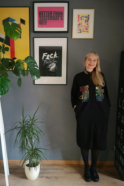 Cool, Comfortable, Versatile Simple Cut Oversized Shirt Dress "Bell Hooks" made in Black Linen Blend fabric with Rainbow  Lāčplēsene patterned Linen details. 