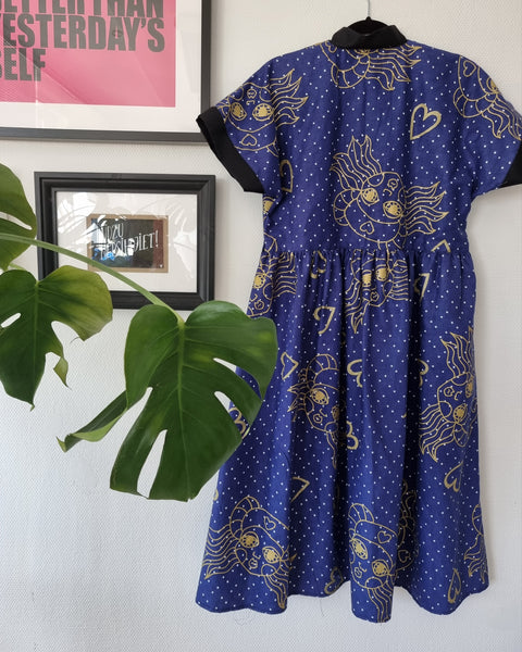 Dark Blue Fun and Cool Short Sleeved Shirt Dress with Wide Skirt Part in Handprinted Patterned Fabric and many Pockets