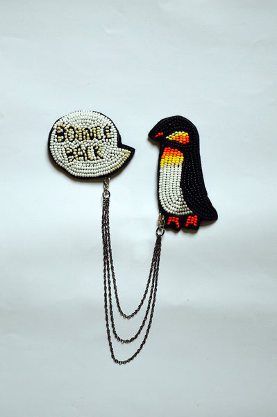 Chain pin with cartoon inspired penguin "I am Resilient" II