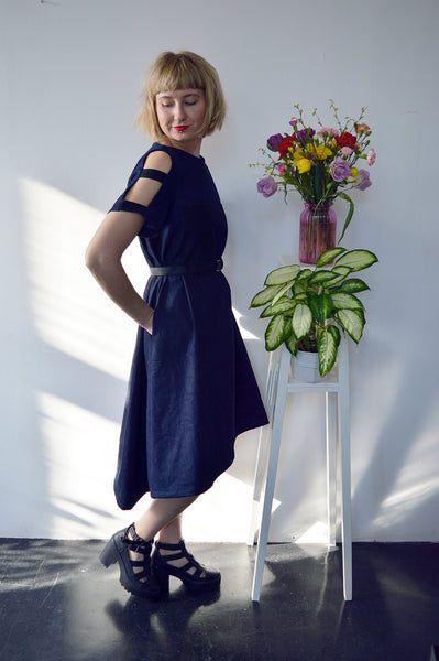 Fresh and New Spring Summer 2018 Dark Blue Statement Denim Dress and Contrast Pockets and Naked Shoulder Detail.