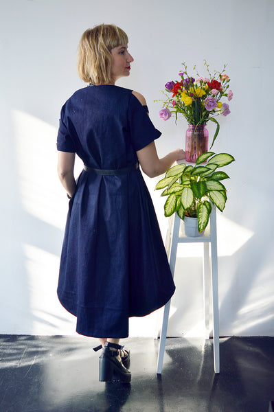 Fresh and New Spring Summer 2018 Dark Blue Statement Denim Dress and Contrast Pockets and Naked Shoulder Detail.