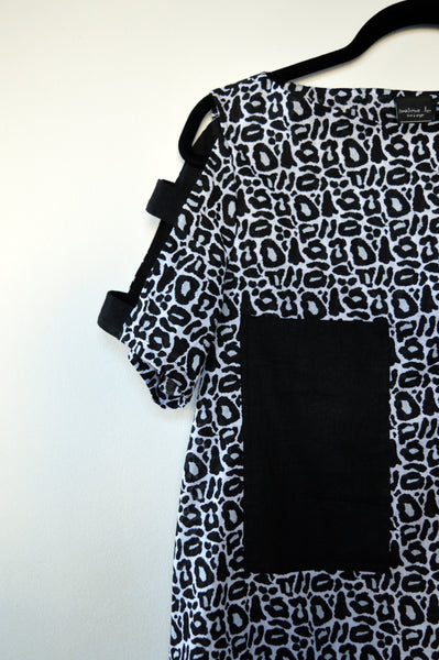 Fresh and New Spring Summer 2018 Black and White Cotton Dress with Contrast Pockets and Naked Shoulder Detail.